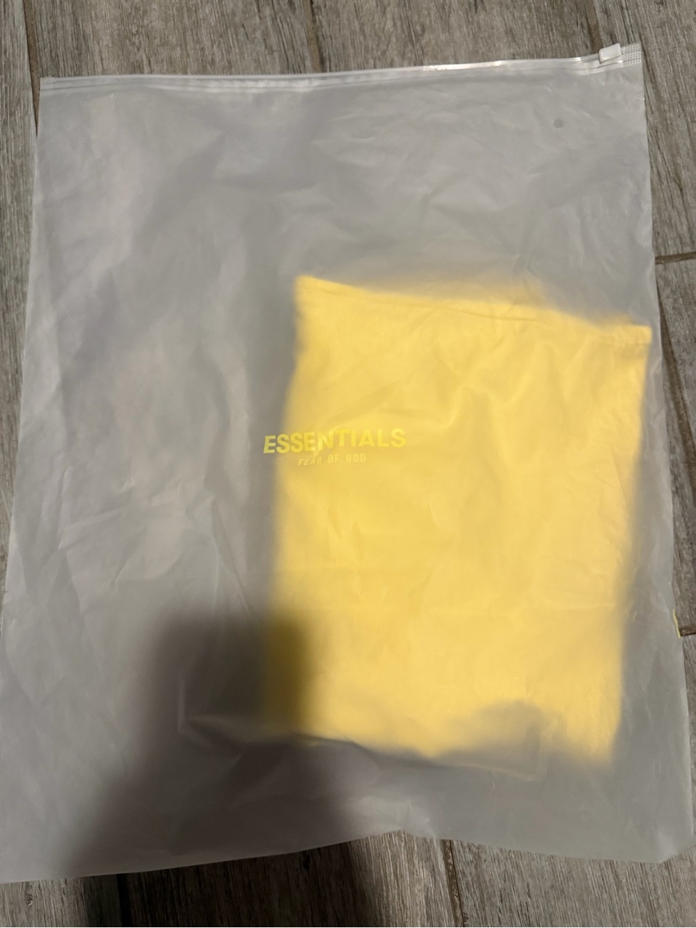 ESSENTIALS Yellow shirt.